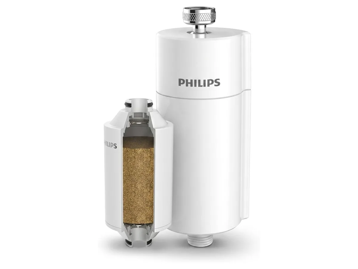 Filtre de douche Philips AWP1775 blanc et coupe de sa cartouche AWP175 montrant le média filtrant
